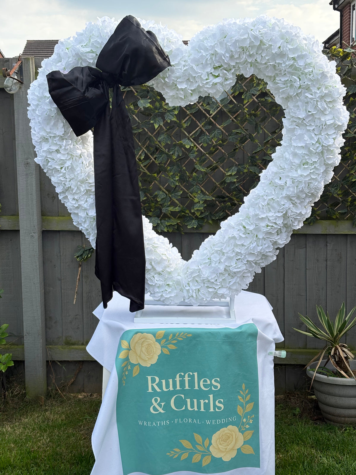 Heart shaped floral decor hire