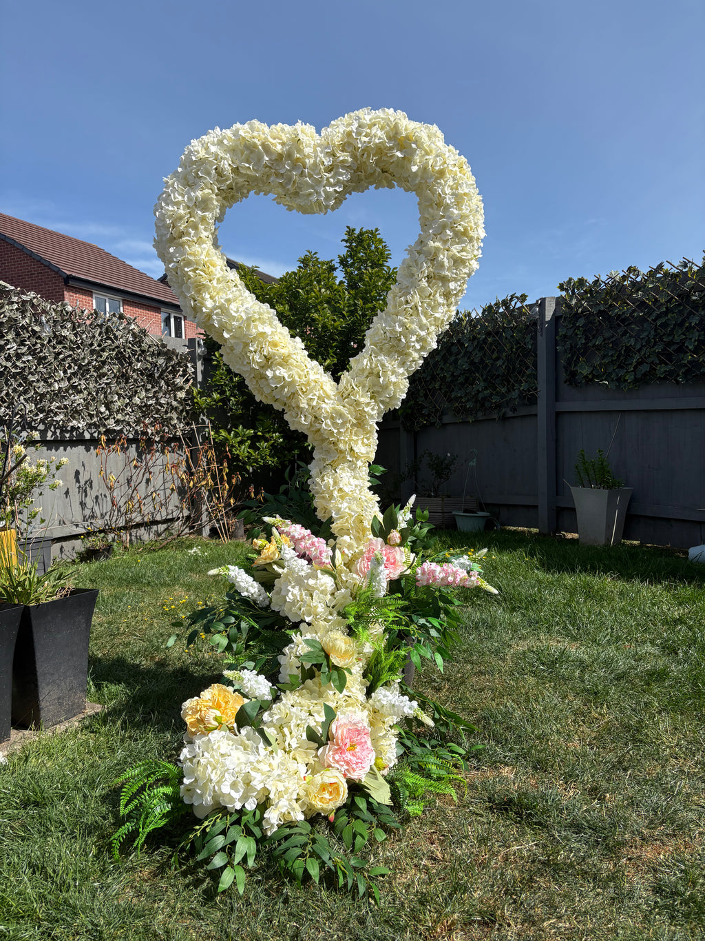Heart shaped floral decor hire