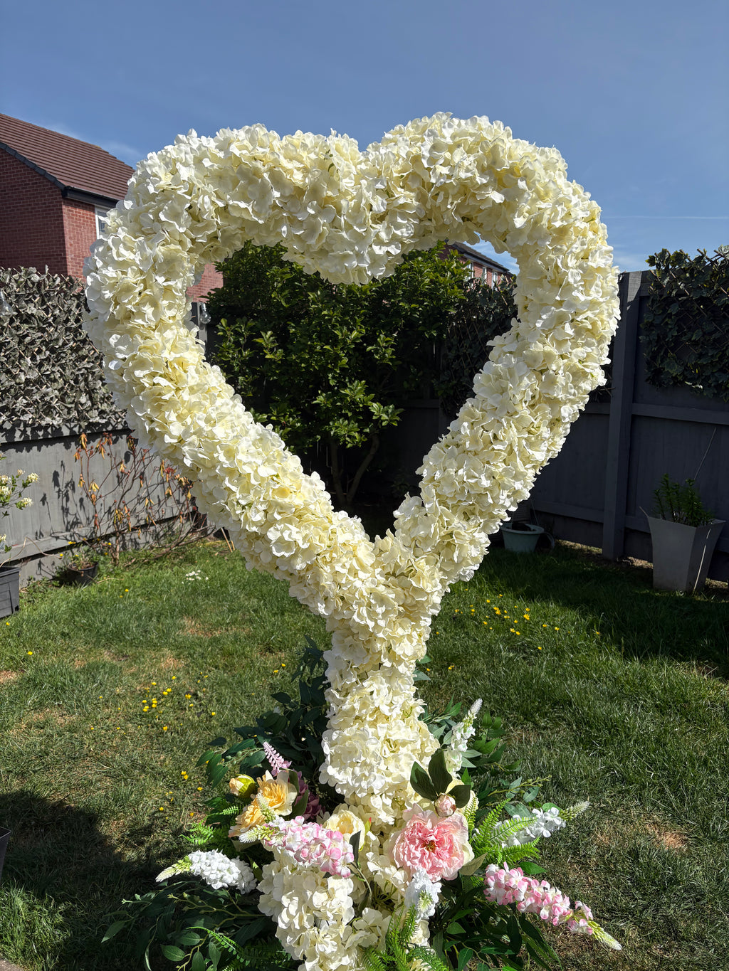 Heart shaped floral decor hire